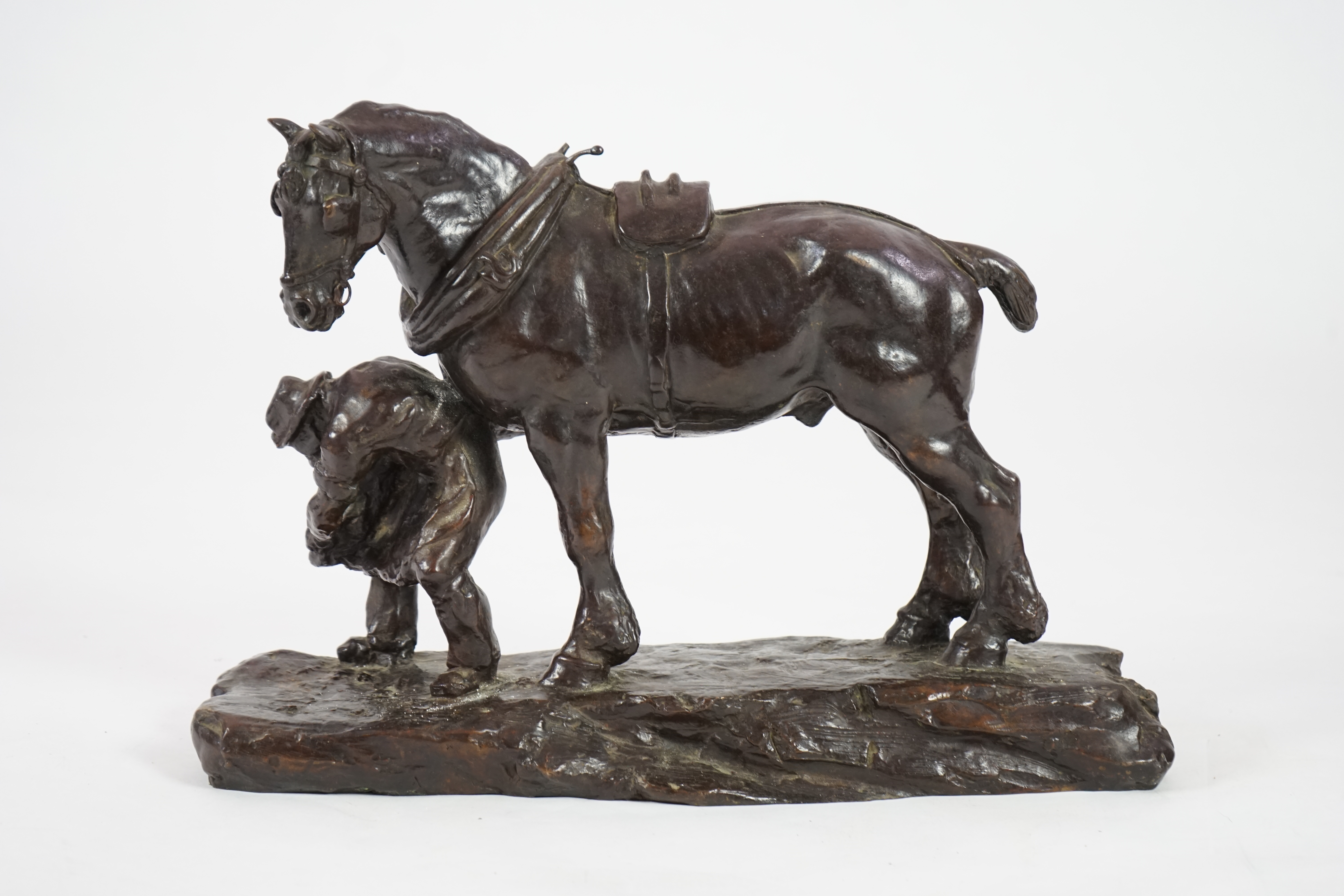 John Rattenbury Skeaping RA (1901-1980). A bronze group, 'Shoeing a cart horse'